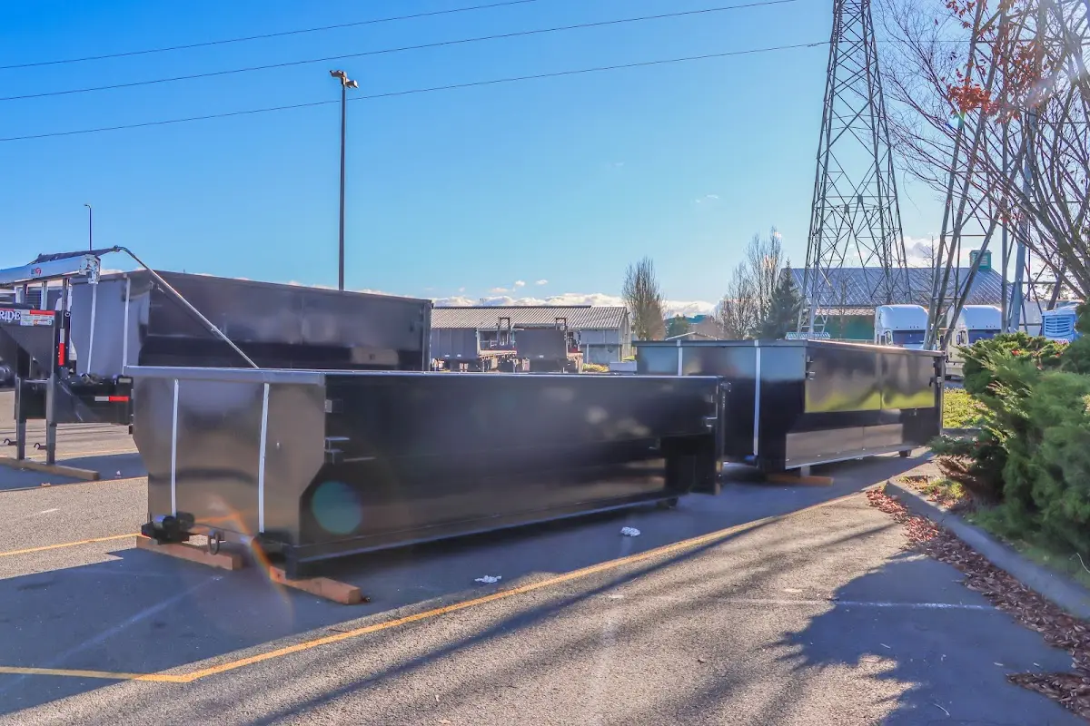 Roll-off dumpster ready for waste disposal at job site for 20 Yard Dumpster Rental in Bigfork